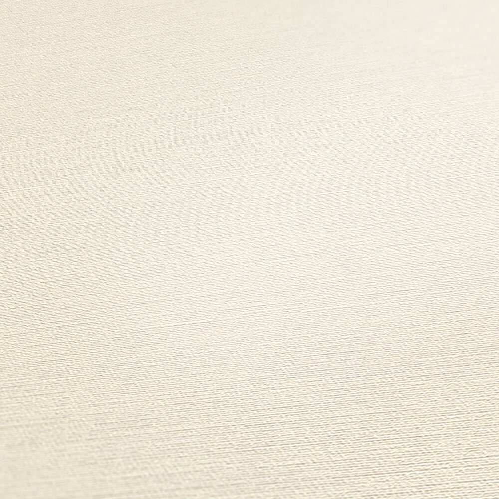             Weiße Tapete einfarbig mit textiler Prägestruktur
        