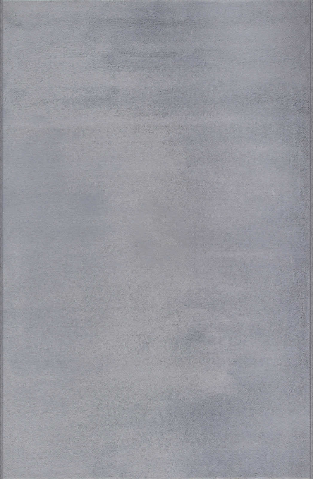             Angenehmer Hochflor Teppich in sanften Grau – 140 x 70 cm
        