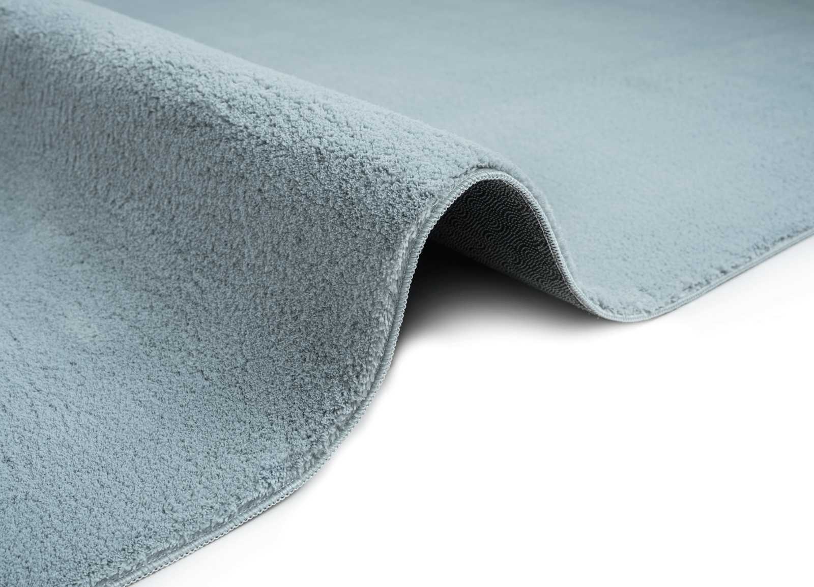             Flauschiger Hochflor Teppich in Blau – 170 x 120 cm
        